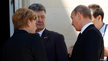Путин встретился с Порошенко в Нормандии В Кремле прокомментировали встречу Путина и Порошенко в Нормандии